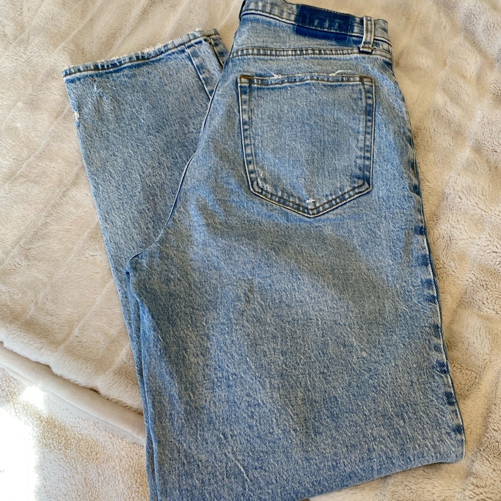 90’s style Ultra high rise jeans. Light blue wash. Worn twice, like new.
